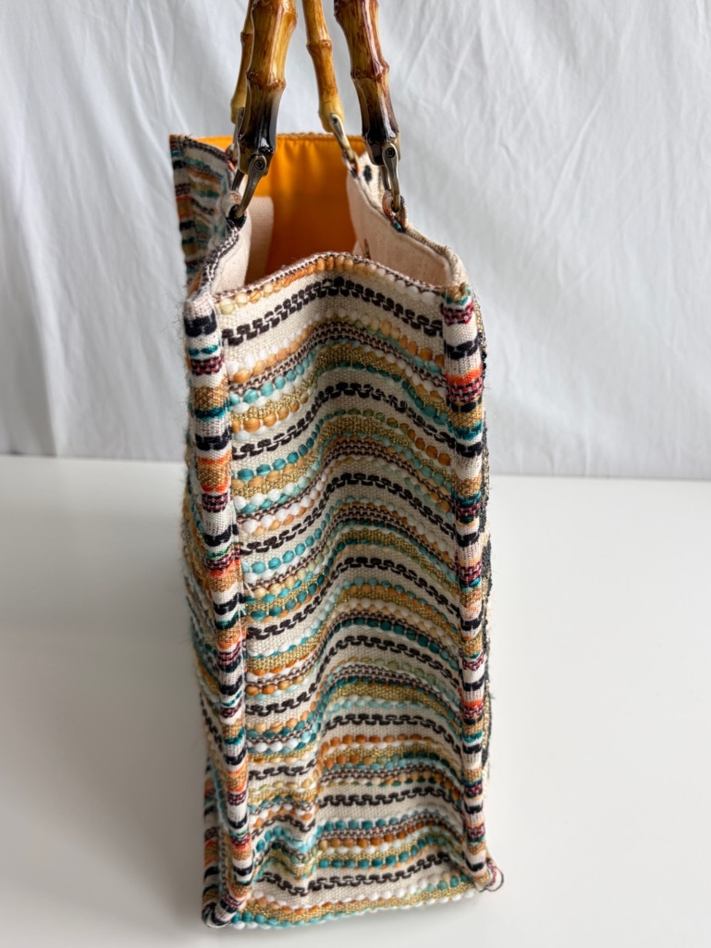 America & Beyond Luxe Leopard Tote Bag
Beaded Bamboo Handles Beige/Black/Orange - Picture 5 of 17